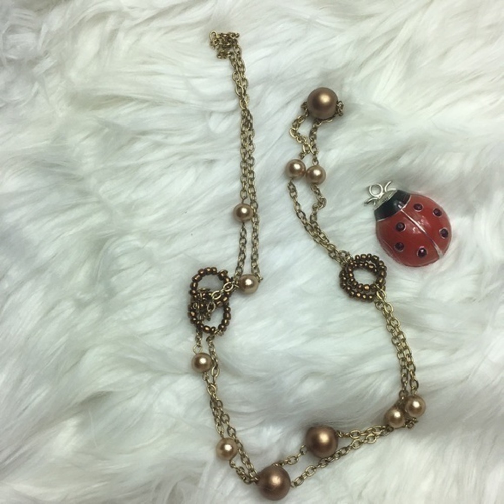 50” long, faux pearl/metal beads necklace. GUC.